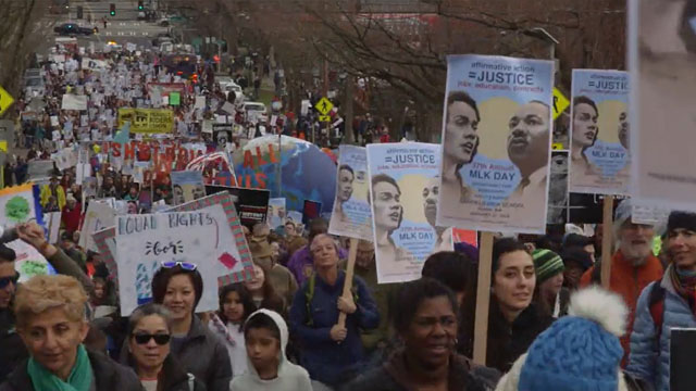 Thousands honor MLK in annual march Thousands honor MLK in annual march