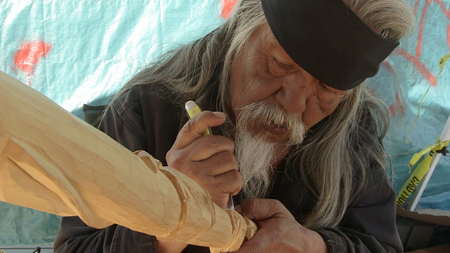 Ten years after police shooting death of brother, still carving through the pain Carving through the pain